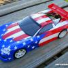 Corvette  C6 done up in patriotic colors.  I love it!  The customer who I did the short course bodies for in red, white and blue carried the theme to his on-road cars too.