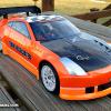 This is a body for me!  HPI Racing Nissan 350Z (Greddy version) done in Faskolor Neon and metallic orange.  I think I can see it on the track!  Associated TC6 underneath.