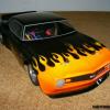 Another HPI 68 Camaro body.  Black with flames done to resemble a car choice on the PS2 "Need for Speed" game.  A Dad and son project.  Cool.