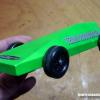 HA!  Custom built "Four Cut" Pinewood Derby car airbrushed with Team Associated scheme and Faskolor neon green!  (For my son)