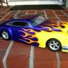 This is another GANGSTAR body from Parma.  Flames with purple metallic.  On an Associated TC3 chassis.  The definition of COOL.