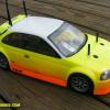 This is a neon Orange/Yellow fade using Faskolor paints.  White roof and backer.  Designed by HPI to fit Mini Cooper Chassis, this Honda Civic Type R is a good looking body for sure!