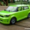 Scion Xb body on a Tamiya M-03 Mini Cooper chassis.  Key Lime Green from Faskolor with neon green backing and then white.  you can see this car coming!