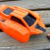 A new 1/8th scale buggy body.  Neon orange with a small area of faux carbon fiber and vent fades.