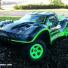 Parma's newest body, the SPEEDFLO!  This is Parma's answer to short course parachuting.  The Speedflo has almost 20 openings!  This one is done in neon green, chrome and black.  I'm running it on my own stock Traxxas Slash.  Yes, I painted the wheels neon green too.  Looks HOT!