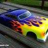 You've seen this body before, but this one is brand new September of 2012.  This is the Parma Gangstar, but it is really a version of ZZ Top guitarist Billy Gibbons "CADZILLA."  All hand cut flames with Faskolor paint.