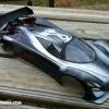 This amazing body design is a Mazda "Furai' from Speed Passion.  Wicked huh!  The guy I painted this for wanted it mostly black and silver.  I think the body looks half mechanical, half biological or insect based.  It is cool!