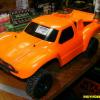 Another neon orange Parma Rattler body on Traxxas Slash.  Note wing on back.