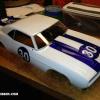 This is a new Vaterra 69 Camaro body. Very scale. Faskolor white and Fasescent blue. (Love that blue! One of their best colors!) I did the graphics and numerals with liquid mask. The body has separate chrome plastic bumpers and side mirrors, but I'll let the racer install those himself.