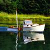 This is my Midwest Products Lobster Boat.  She's over 25 years old now and still going strong.  Her name is "LOPYSTRE" which is the Old English spelling of Lobster.  Electric MEPS motor and 7.2v batteries give me over 1 hour run time!